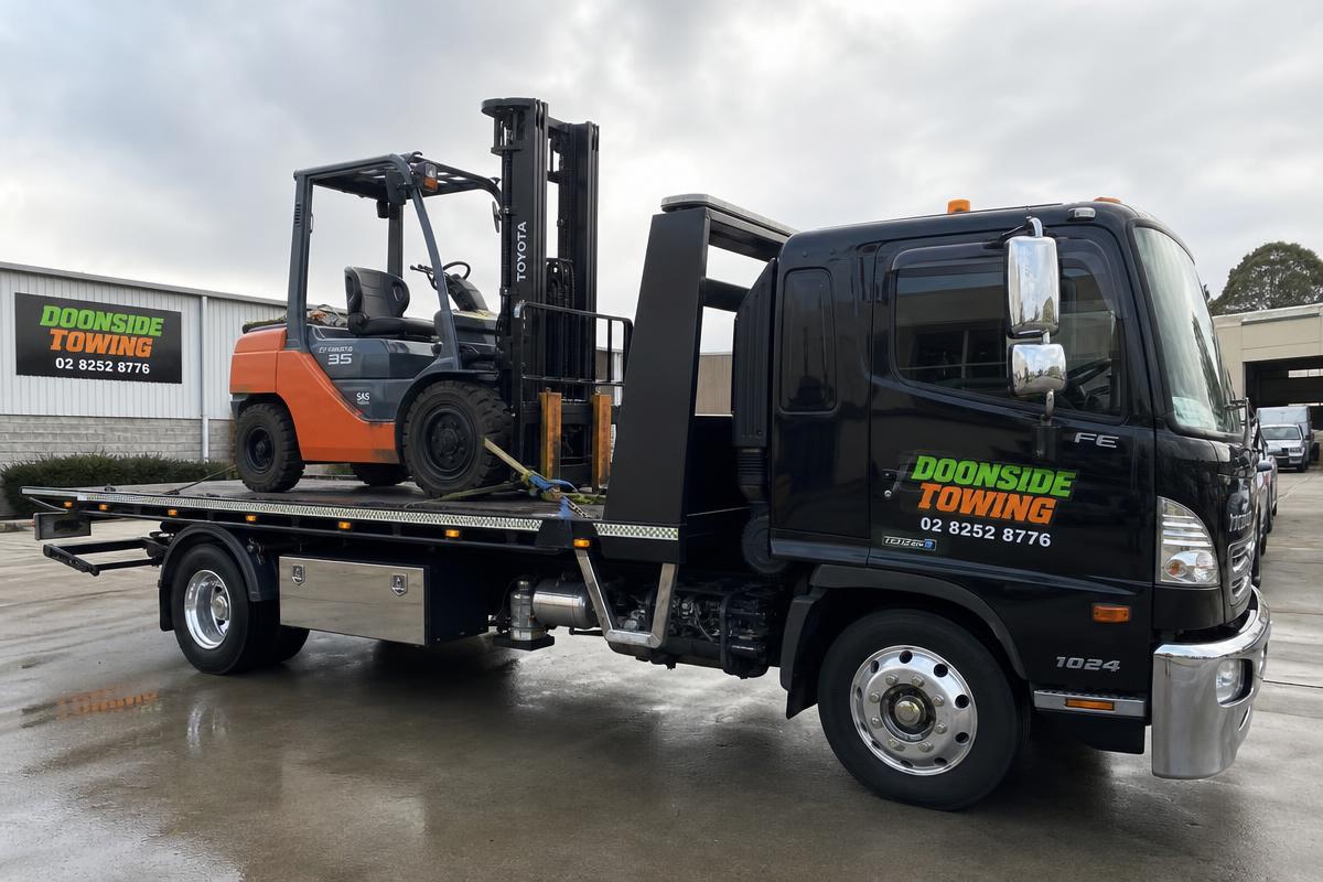 Forklift loaded on Doonside Towing flatbed